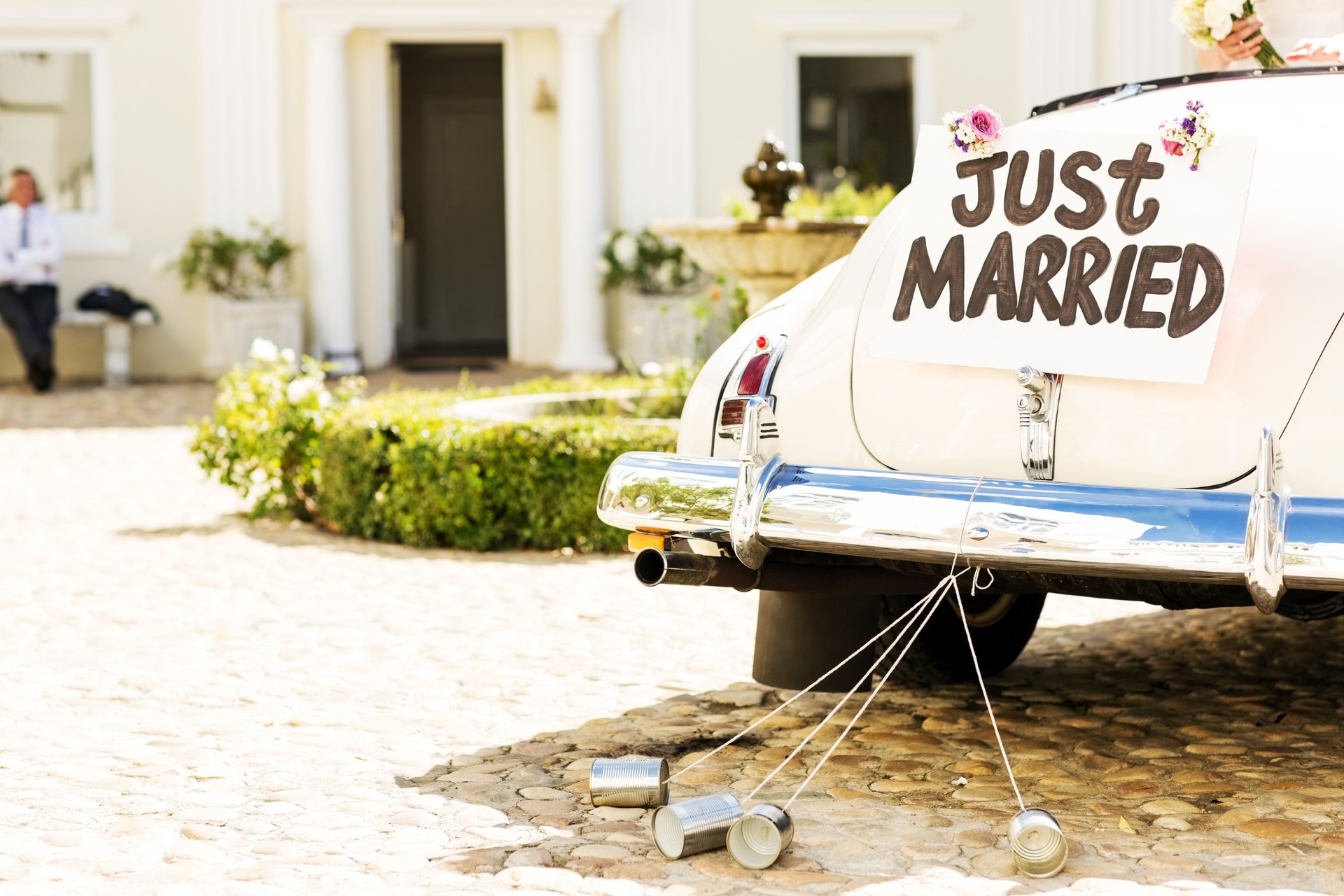 Just Married Sign And Cans Attached To Car Just Married Sign And Cans Attached To Car